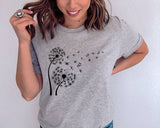 "Dandelion In The Wind" design on a heather gray unisex t-shirt