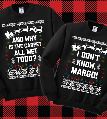 "Why Is the Carpet All Wet, Todd?" and "I Don't Know, Margo!" ugly sweater design on a black unisex crewneck sweatshirt