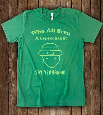 "Who All Seen a Leprechaun? Say Yeah!" leprechaun face design on a green unisex t-shirt